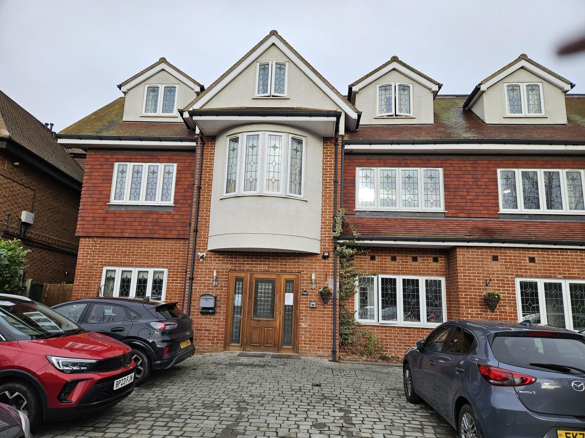 The grand Tudor-style exterior of Moreland House Care Home in Hornchurch, Essex
